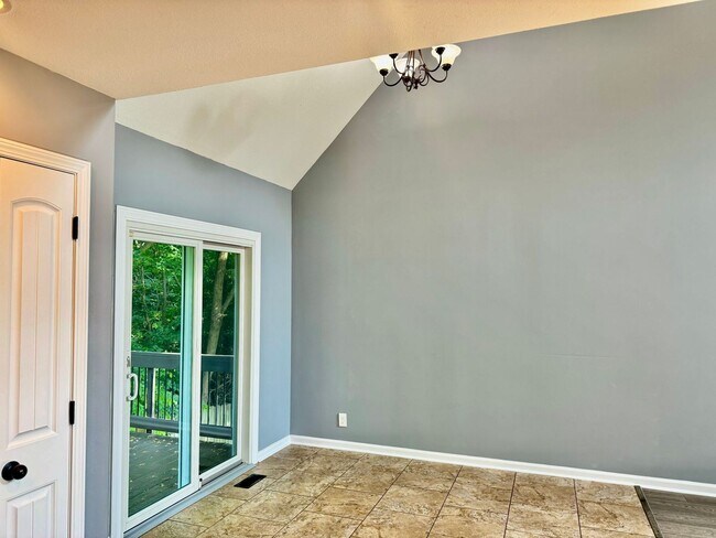 Building Photo - Large Open 4 Bedroom Home with Bonus! Tree Lined Backyard with Privacy Fence!