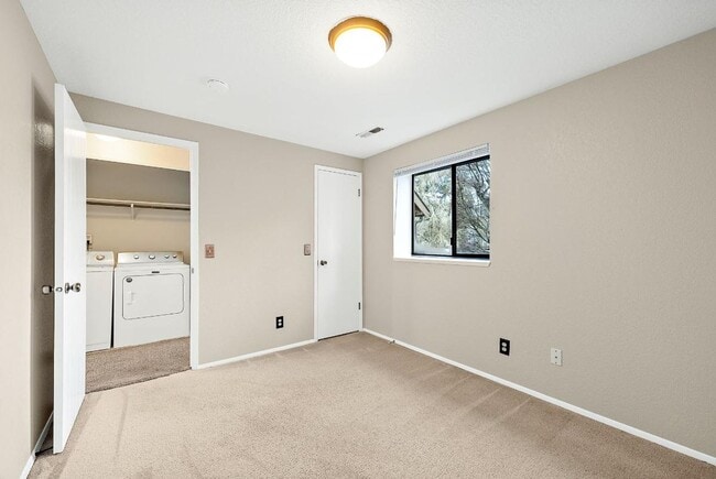 Building Photo - Light & Airy 2-Bedroom Tumwater Apartment with Pool, Covered Parking & Full-Size W/D