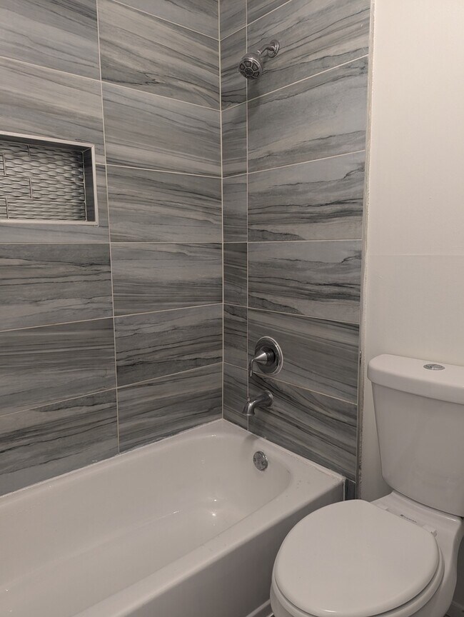 Building Photo - Charming 2-Bedroom, 2-Bath Condo with Mode...