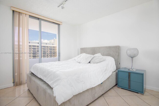 Building Photo - 5555 Collins Ave