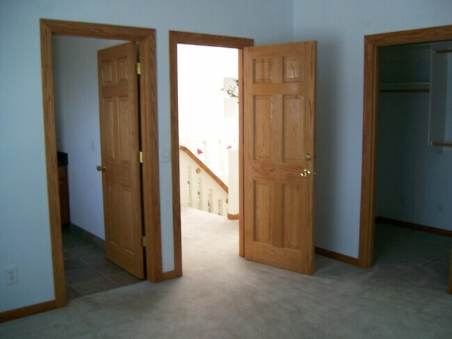 Building Photo - Centrally Located Custom Home each bedroom...