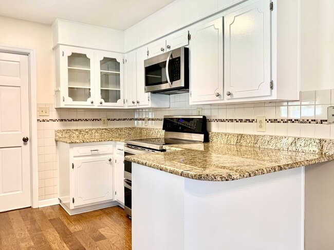 Building Photo - Charming Updated Home, Quiet Street Near Base, Fenced Yard!