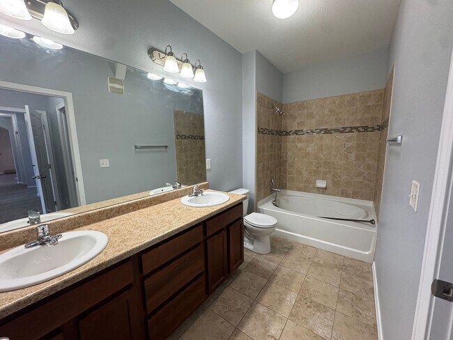 Building Photo - Move-In Ready Top-Floor Condo with New Flooring & Fresh Paint