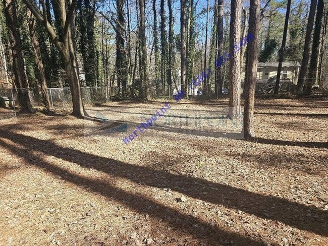 Building Photo - Beautiful 4BR 2BA Home w/ Quartz + SS Kitchen • Fenced Yard • Deck & Porch in SW Atlanta