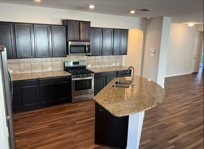 Building Photo - "Charming 4-Bedroom Home with Granite Elegance in San Antonio!"