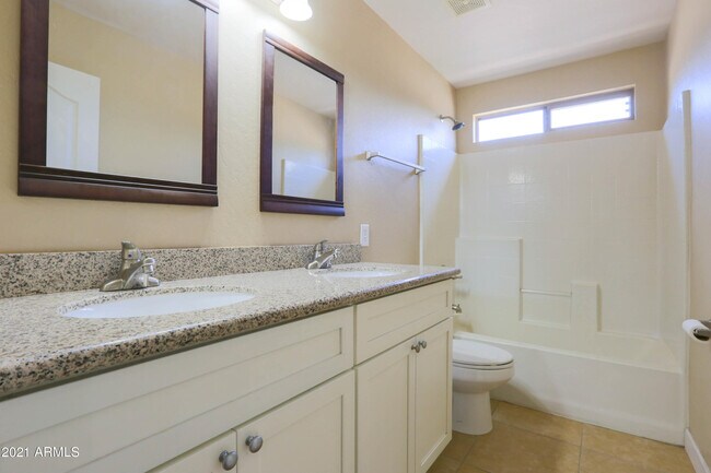 Building Photo - 7456 W Aurora Dr
