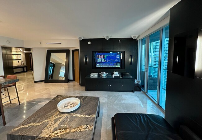Living room 85" TV - 500 Brickell Ave