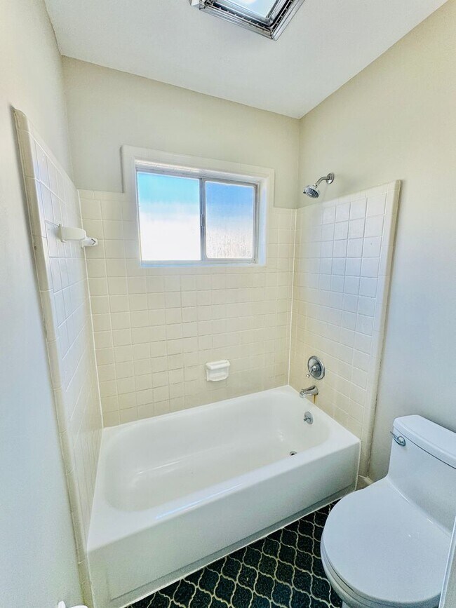 Building Photo - Updated 4-Bedroom Ranch with the layout everyone wants