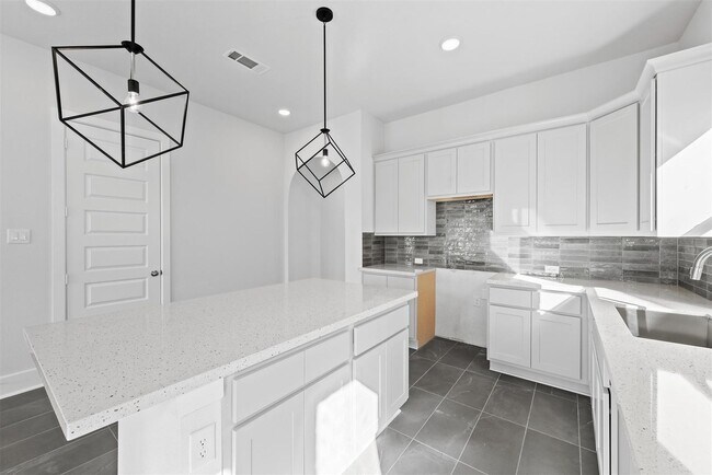 Building Photo - Two story. 4 bedrooms. 3.5 baths. Spacious...