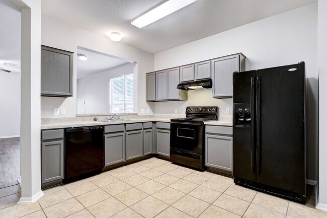 Building Photo - 3-Bedroom Townhouse with Open Floor Plan and Spacious Backyard Near Lackland AFB