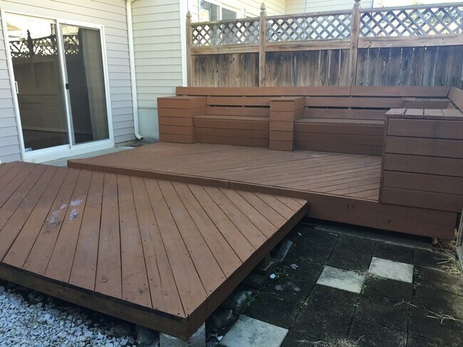 Building Photo - Gas Fireplace! Fenced-in Patio! Storage Space!