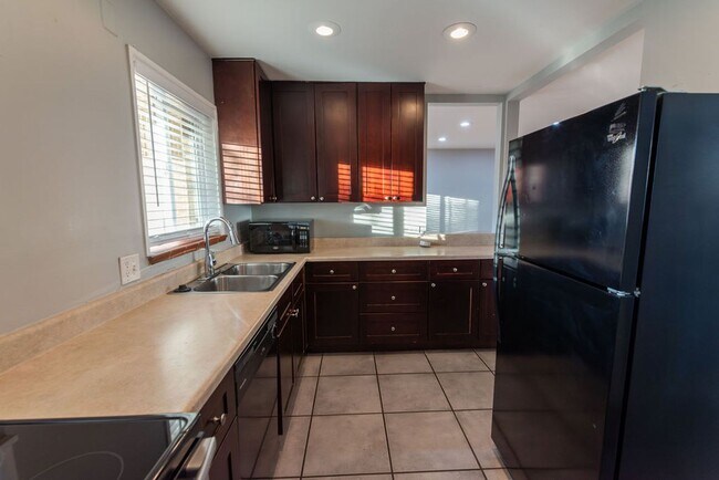 Building Photo - Move in now — $0 rent due until March 1st! - 3BR/2BA Single-Family Home Across from Sloan’s Lake ...