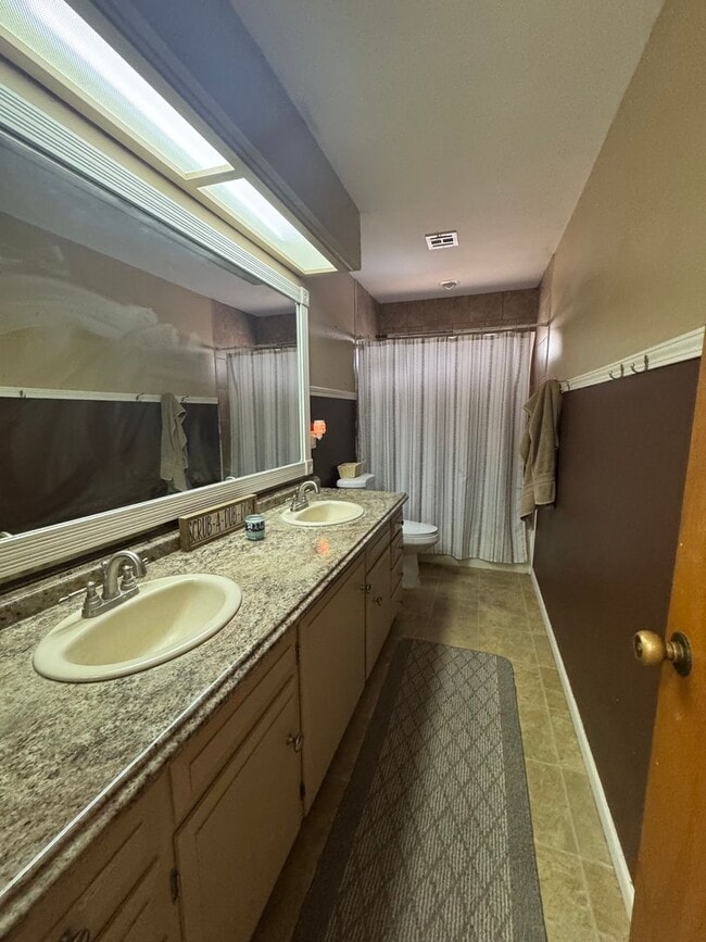 Building Photo - Spacious 4 Bedroom, 2 Bath Home with Solar...