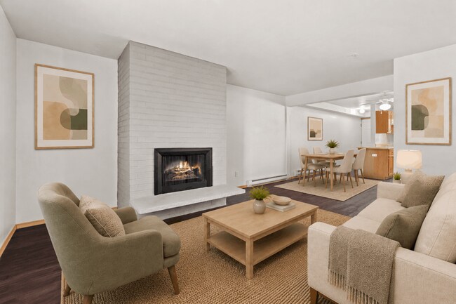 Staged open-concept living designed for comfort. - Villas at Lawrence