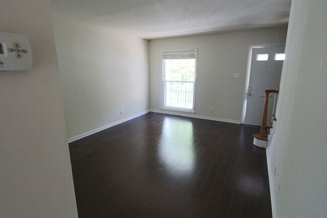 Building Photo - Apply Today! 2 Bedroom - 1.5 Bath condo with garage - heat and hot water included