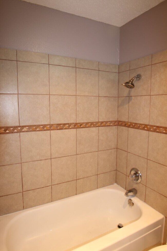 Building Photo - Cozy 3/2 Burleson Charmer | Wood-Burning Fireplace | 2-Car Garage | Pet-Friendly