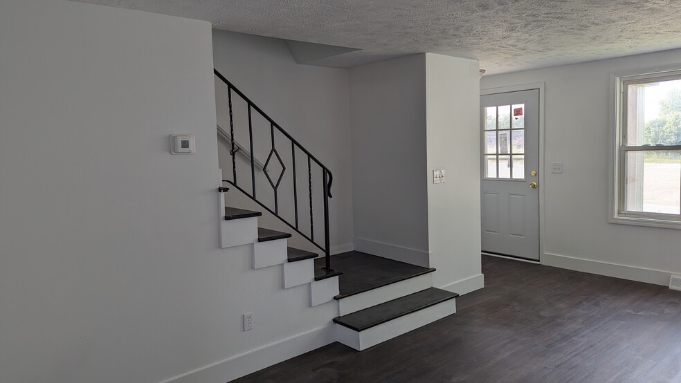 Stairs to second floor - 1407 E Valentine Cir NW