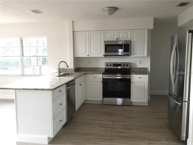 Building Photo - 8484 Belmont Rd