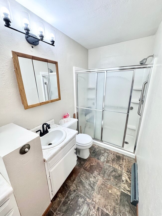 Building Photo - 102 E 8th St