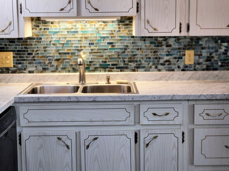 Kitchen, new counters, back splash - 2380 World Parkway Blvd