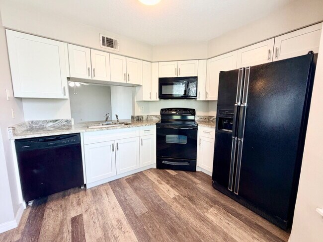 Building Photo - *** HALF OFF SECOND MONTH RENT *** "Charming 3-Bed Condo with Scenic Views & Granite Finishes in ...