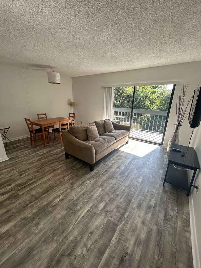 Building Photo - Now Leasing: 1-bedroom and 1.5 bath condo ...