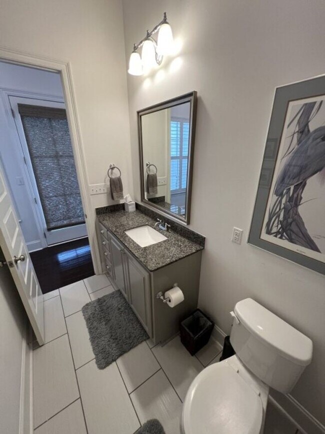Building Photo - Luxury 4BR Home in Americana | 11 Ft Ceilings, Courtyard Living & Furnished Option