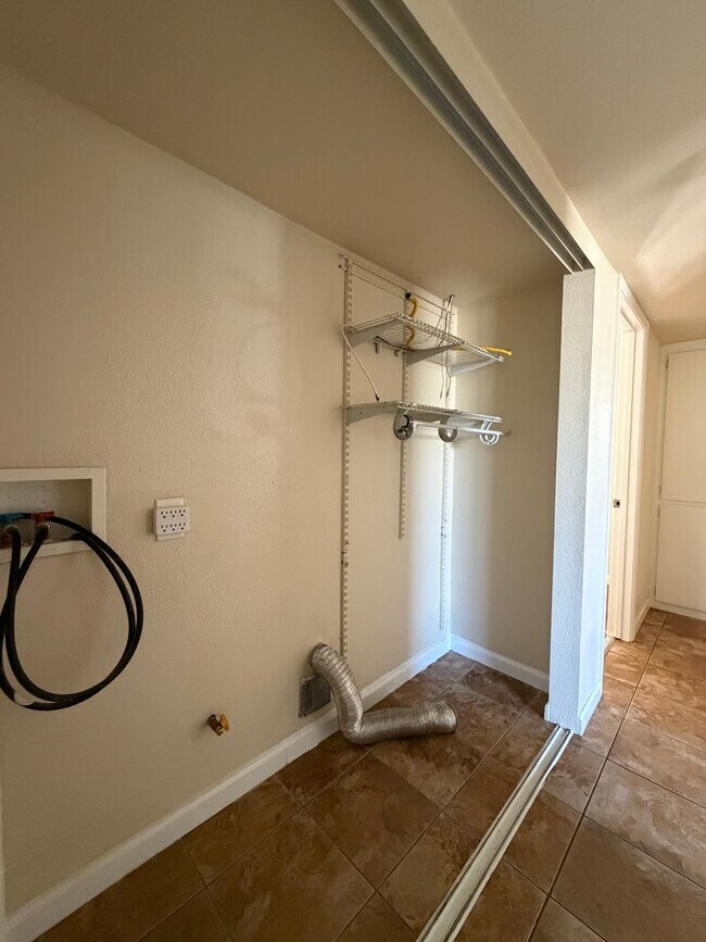 Building Photo - 3 Bedroom 2 Bathroom House with Central A/C , 2 Car Garage and Beautiful Backyard with Covered Patio