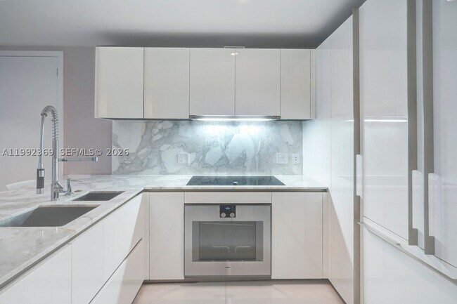 Building Photo - 10203 Collins Ave