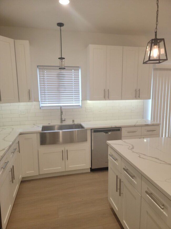 Building Photo - Brand New 4 Bed 3 Bath Modern Farmhouse Style Duplex in Mead with over 1850 Sq. Ft. on Huge Lot.