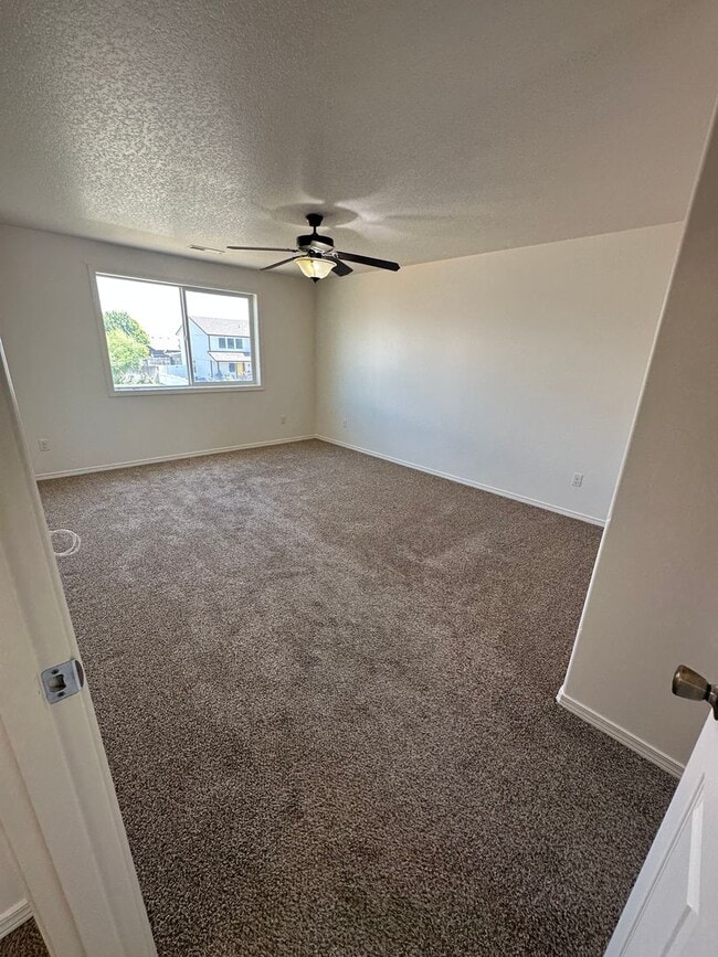 Building Photo - Spacious 4 Bedroom, 3 Bath Home with Fence...