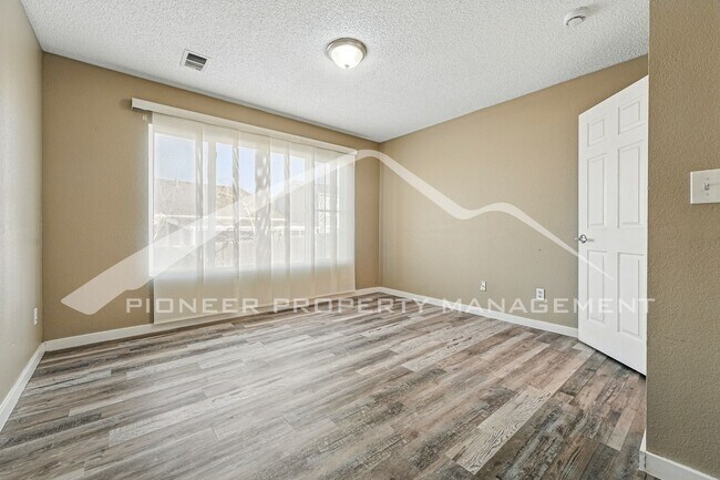 Building Photo - Spacious 3-Bedroom Home with Modern Features and Private Yard