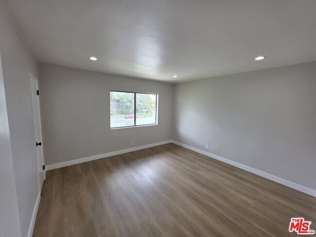 Building Photo - 14747 Woodruff Ave