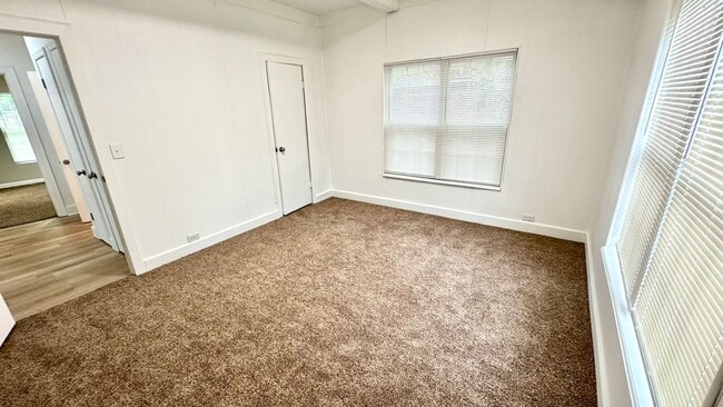 Building Photo - Spacious 3 Bedroom Home with Modern Updates & Shop