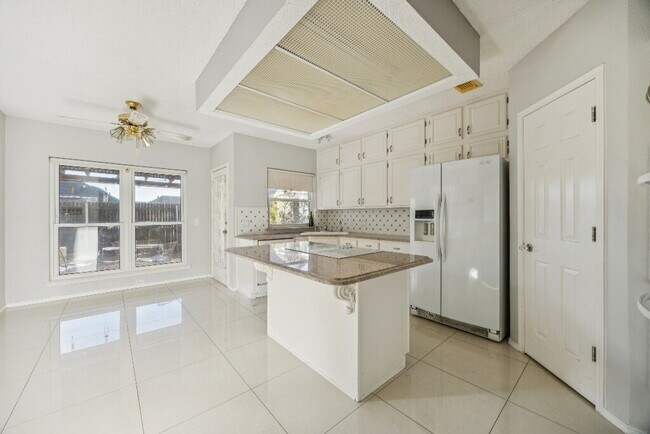 Building Photo - "Spacious 4-Bedroom, 2.5-Bath Living Meets Storybook Backyard Charm!"