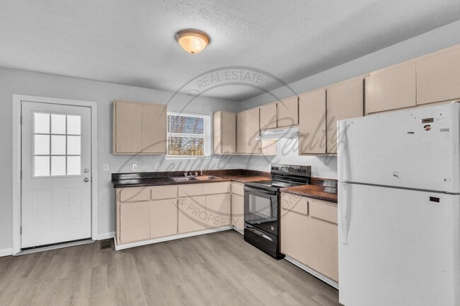 Building Photo - On Special: Two Bedroom Ranch Duplex in North Gallatin!