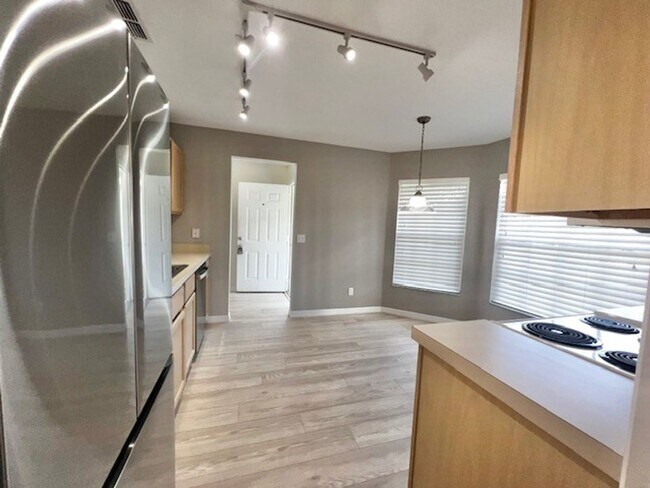 Building Photo - Welcome Home! Updated flooring & fresh interior paint! Move in OCTOBER! Beautiful 3X2 with attach...