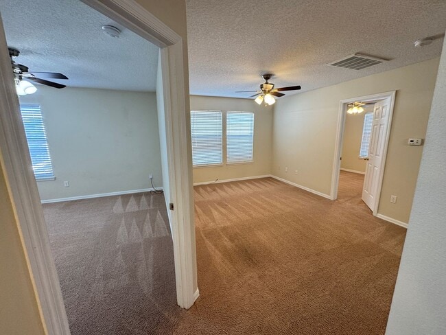 Building Photo - Spacious 4-Bedroom Home with Private Pool and Modern Comforts