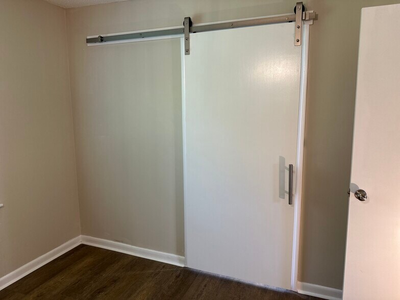 Door from Primary BR into the bathroom. - 9 Garden Ln