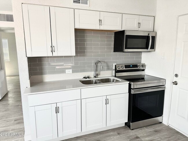 Building Photo - 6808 N 23rd Ave