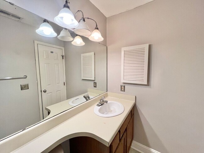 Building Photo - Charming Two-Story 2BD, 2.5BA Raleigh Cond...