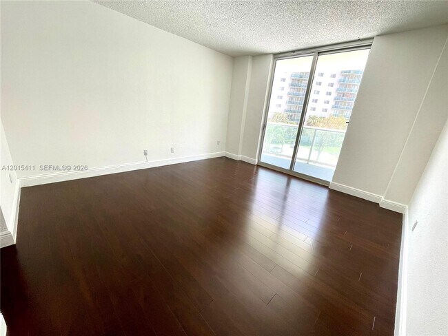 Building Photo - 19390 Collins Ave