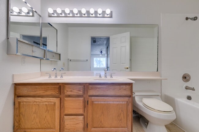 Building Photo - Charming Second-Floor Condo with Two Bedrooms and Fireplace