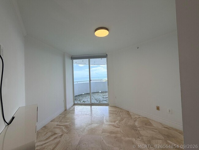 Building Photo - 6301 Collins Ave