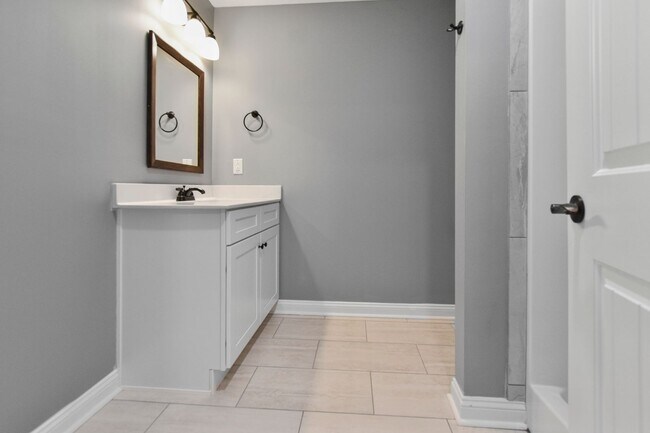 Building Photo - Pet Friendly Three Bedroom with Bonus!