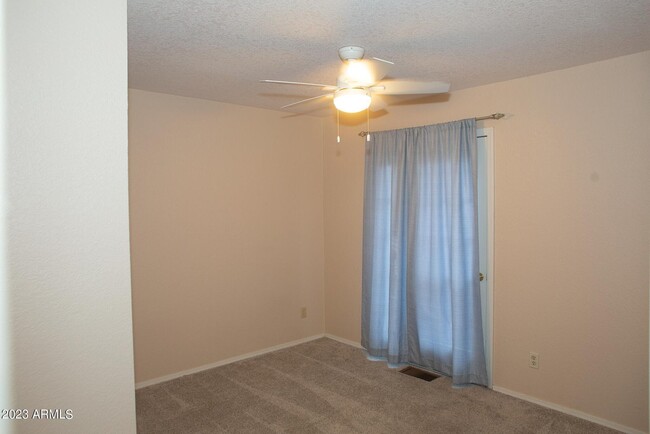 Bedroom 2 w private balcony - 1003 N Matterhorn Rd