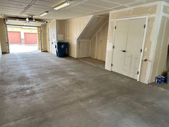 Building Photo - Large garage with attached spacious 2 bedroom townhome