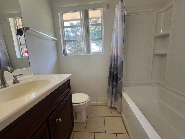 Building Photo - Charming 4-Bedroom Brick Home on Spacious ...