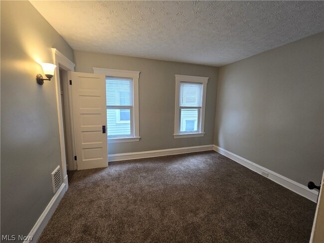 Building Photo - 9807 Parkgate Ave