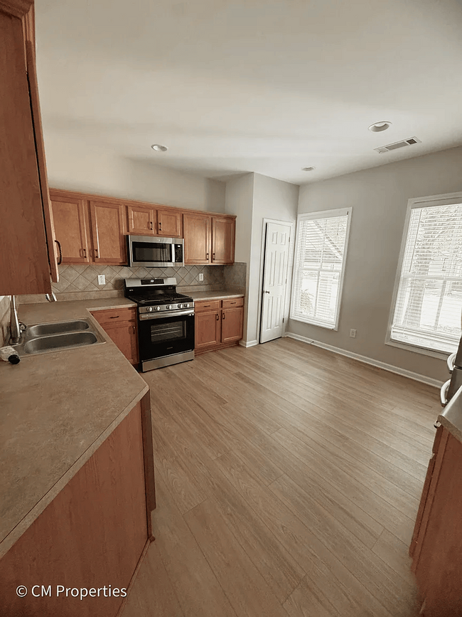 Room for small table to look onto green space while having your morning coffee. - 3968 Boston Common St